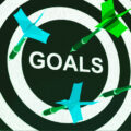 goals-on-dartboard-shows-aspirations-SBI-300168728-VhthiH.jpg