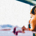 portrait-of-young-beautiful-caucasian-woman-looking-outside-a-window-smiling-thinking-SBI-304229749-qGpPvu.jpg