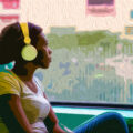 young-black-woman-listening-music-travelling-by-bus-looking-outdoor-the-window-pensive-SBI-304225166.jpg